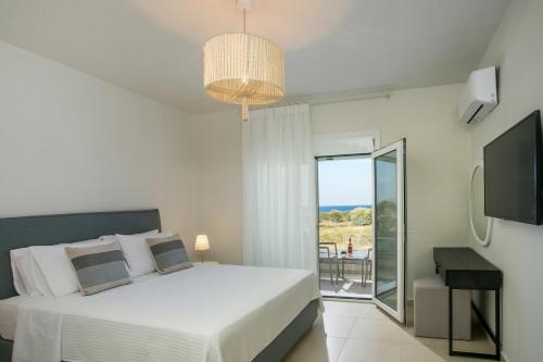 Postel nebo postele na pokoji v ubytování Villa Ariadne