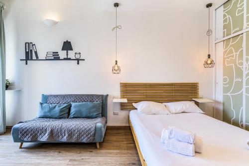 Кровать или кровати в номере Travel Inside Srl - Ripa 127 Apartment Navigli
