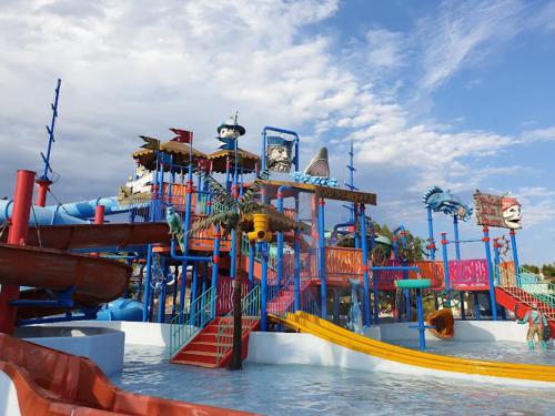 a water park with a slide in the water at Charming T2 in Cannes center in Cannes