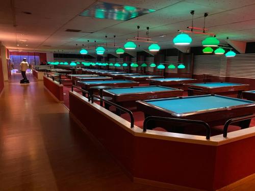 a row of ping pong tables in a restaurant at Charming T2 in Cannes center in Cannes