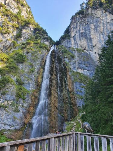 a waterfall on the side of a mountain at Mountain Pearl in Maurach