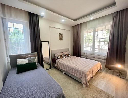 Postel nebo postele na pokoji v ubytování Home with 2 rooms in center of Antalya