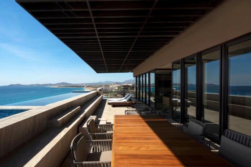 a view of the ocean from the balcony of a building at Casa Maat at JW Marriott Los Cabos Beach Resort & Spa in San José del Cabo
