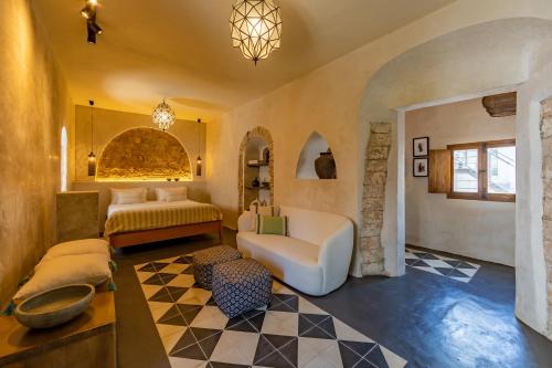 Postel nebo postele na pokoji v ubytování The Riad - Adults Only