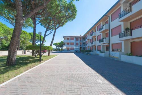 a walkway in front of a building at Park Residence Immobiliare Pacella in Lido di Jesolo