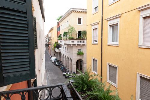 a view of a city street from a balcony at Residenza Catullo in Verona