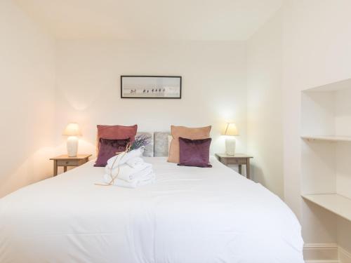 Katil atau katil-katil dalam bilik di Pass the Keys Trendy Flat in Sunninghill's Village Atmosphere