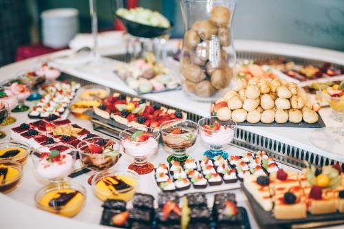 a buffet with many different types of food on a table at Grand Muthu Forte do Vale in Albufeira