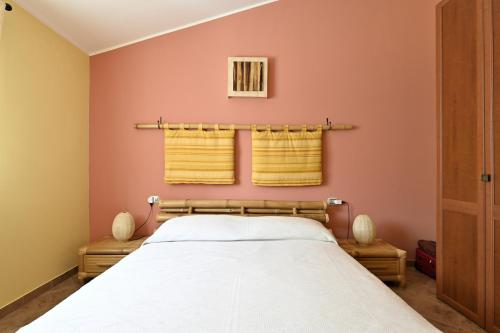 Ένα ή περισσότερα κρεβάτια σε δωμάτιο στο Villa Dalila