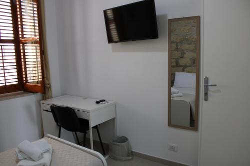 TV a/nebo společenská místnost v ubytování B&B Marco Polo