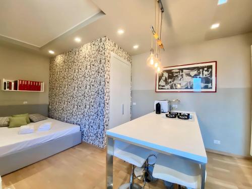 GuestHost - Viale Umbria White & Cosy Studio