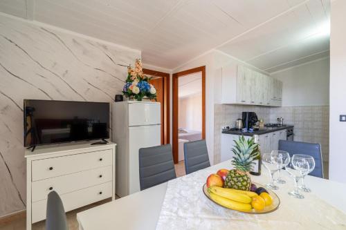 Η κουζίνα ή μικρή κουζίνα στο Luxury and Comfort in a Sea View Apartment