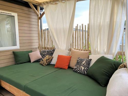Postel nebo postele na pokoji v ubytování Camping La Clape Village