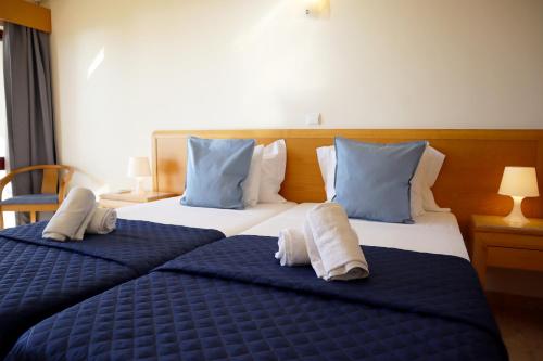 Postel nebo postele na pokoji v ubytování 1501 - Clube Praia Mar