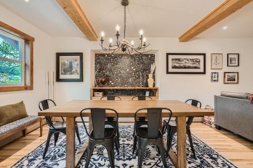 a dining room with a wooden table and chairs at Trollhagen 5 Condo in Breckenridge