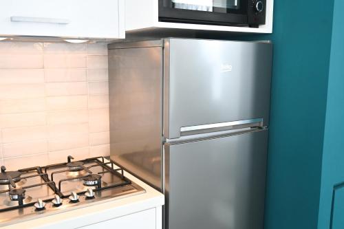 Η κουζίνα ή μικρή κουζίνα στο Don Raffaè - Luxury Apartment