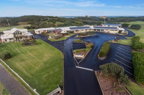 an aerial view of a large house with a road at Logans Beach Whale Nursery Apartments - The Loft in Warrnambool