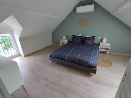 Katil atau katil-katil dalam bilik di Maison de campagne avec terrain