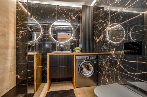 Bathroom sa Apartamenty Premium Shellter Rogowo - ALL DAY HOLIDAY