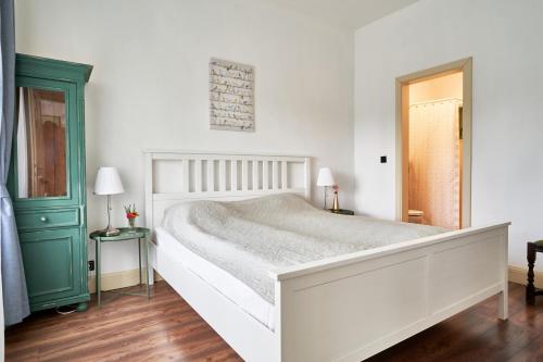 Un ou plusieurs lits dans un hébergement de l'établissement Maison BOGArT