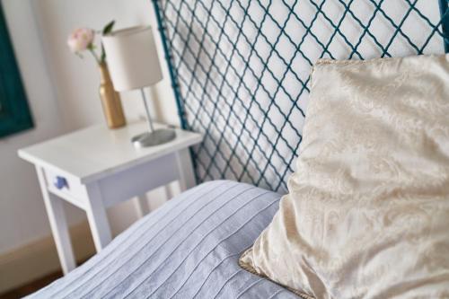 Un ou plusieurs lits dans un hébergement de l'établissement Maison BOGArT