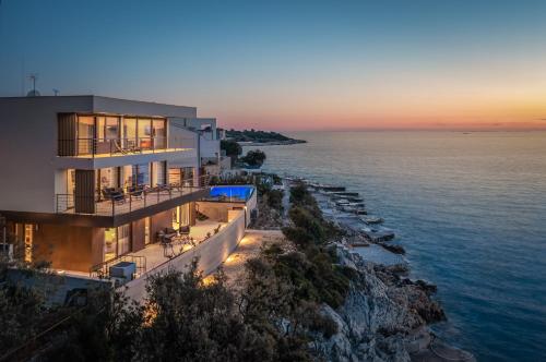 Beachfront Villa Punta Planka with Pool