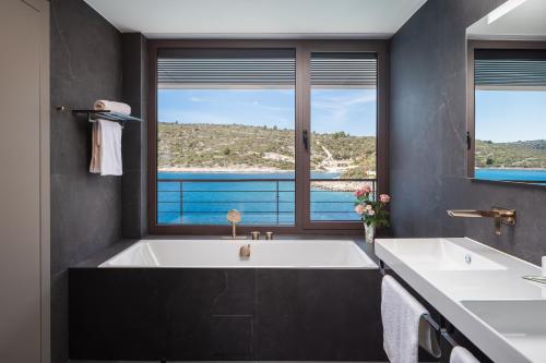 Beachfront Villa Punta Planka with Pool