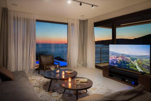 Beachfront Villa Punta Planka with Pool