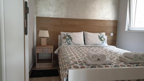 Postel nebo postele na pokoji v ubytování Apartman 3 BMB