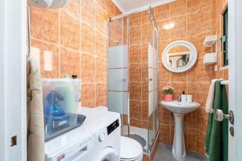 Ванная комната в Casa da Quelha