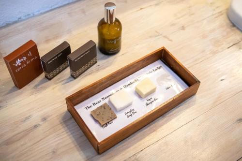 a box of cheese and a bottle of honey at Qambathi Mountain Lodge in Kamberg Valley