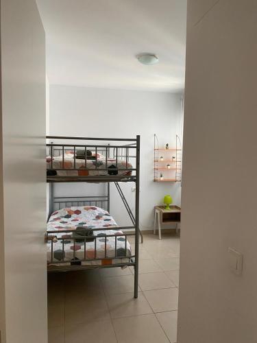 - une chambre avec 2 lits superposés dans l'établissement Apartamento VI-DA SOL, à Puerto de Sagunto