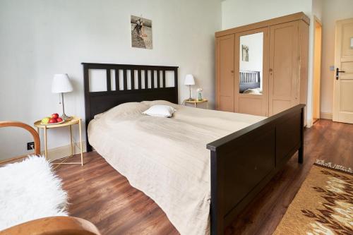 Un ou plusieurs lits dans un hébergement de l'établissement Maison BOGArT