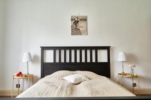 Un ou plusieurs lits dans un hébergement de l'établissement Maison BOGArT