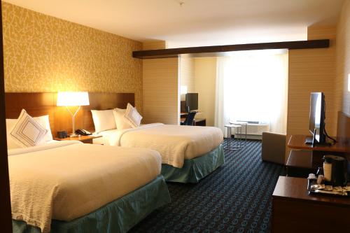Letto o letti in una camera di Fairfield Inn & Suites by Marriott Dallas Plano North