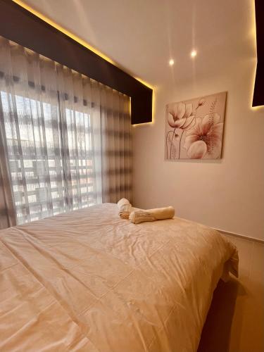 Postel nebo postele na pokoji v ubytování Appartement moderne au décor raffiné