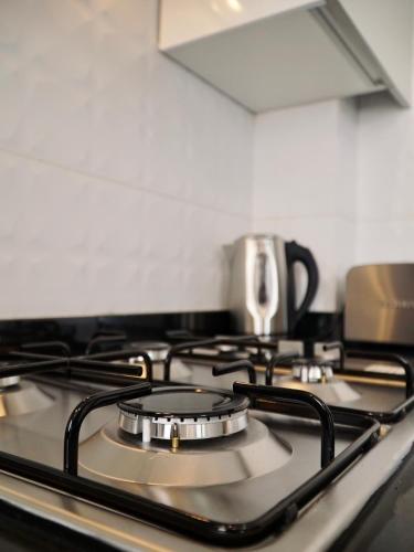 Kuchyň nebo kuchyňský kout v ubytování Appartement moderne au décor raffiné
