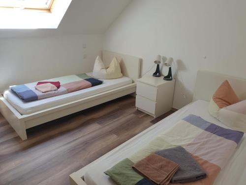Katil atau katil-katil dalam bilik di Ferienwohnung 3 - Gourmetzimmer