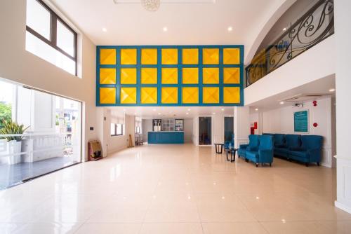 an empty lobby of a hospital with a large window at Minh Chau Pearl Hotel & Spa - Quan Lan Island in Quang Ninh