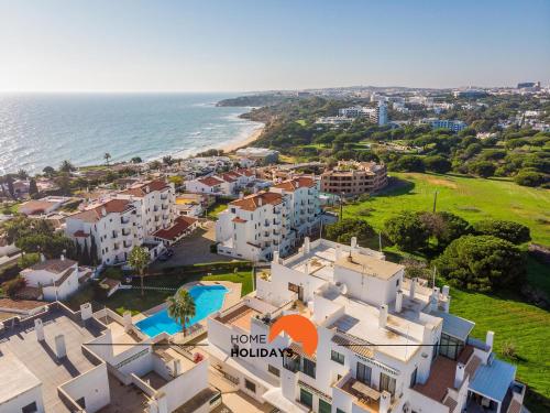 an aerial view of houses and the ocean at #071 Spacious Seaview with Pool, Tennis Court and AC in Albufeira