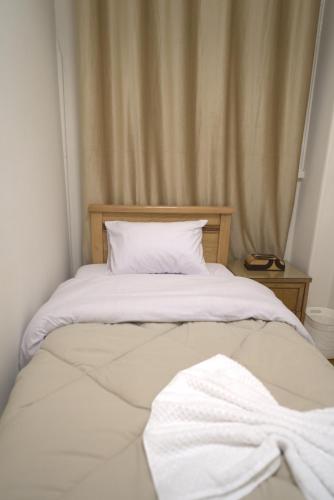 Central Cairo Hotelにあるベッド
