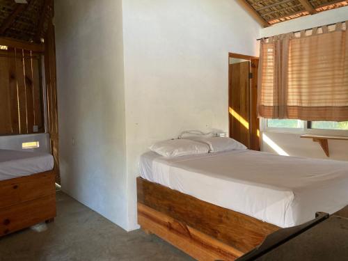 Säng eller sängar i ett rum på Punta Mar