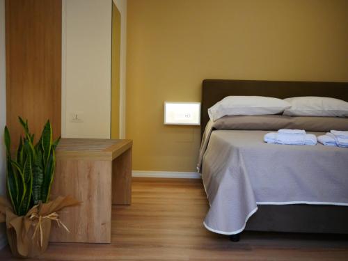 Postel nebo postele na pokoji v ubytování B&B Civico 66