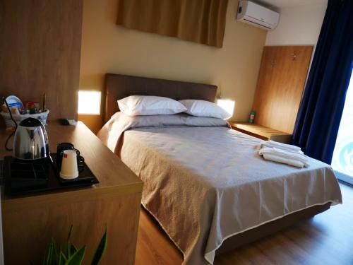 Postel nebo postele na pokoji v ubytování B&B Civico 66