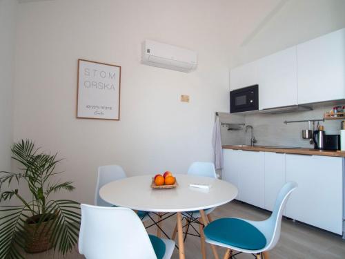 Kuchyň nebo kuchyňský kout v ubytování Sunny Apartments