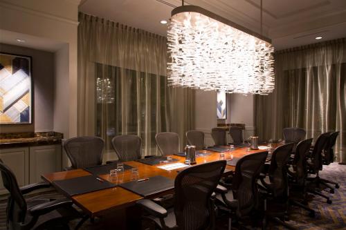 a conference room with a long table and chairs at Franklin Marriott Cool Springs in Franklin