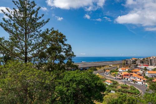 a view of a city and the ocean at Matur I by An Island Apart in Água de Pena