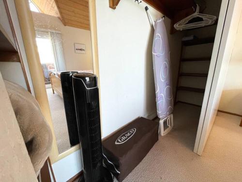 a room with a bed and a box in a room at IB Seaside Paradise w/ Ocean Views! in Imperial Beach