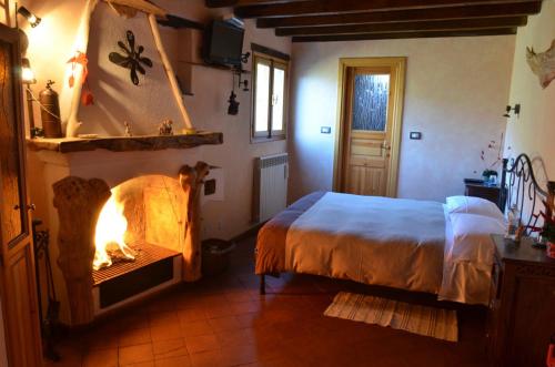 Postel nebo postele na pokoji v ubytování B&B Da Giua'
