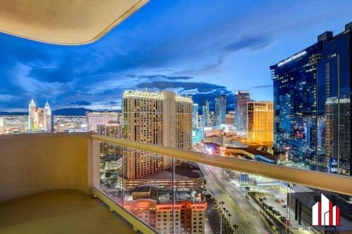 a view of a city skyline from a balcony at MGM Signature-27-805 F1 Track & Strip View Balcony in Las Vegas